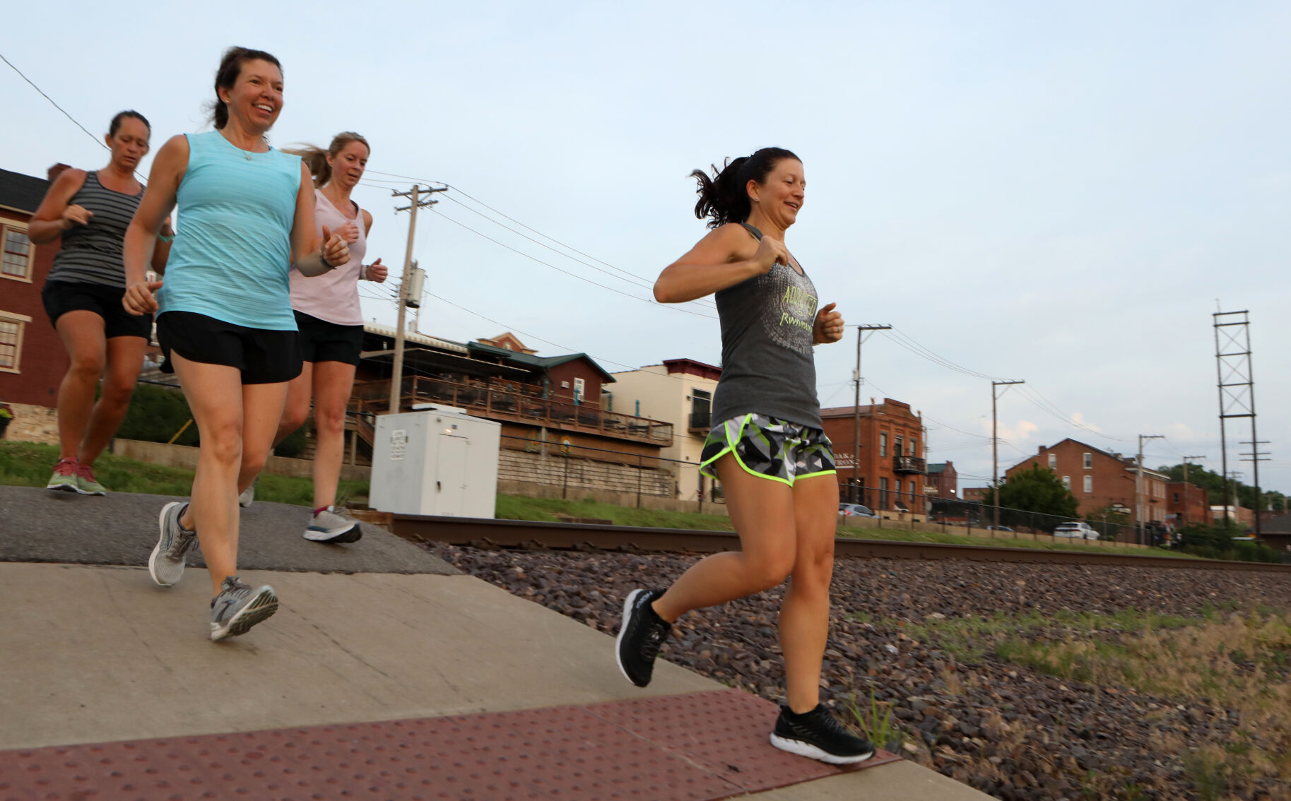 Daily Run Club members jog